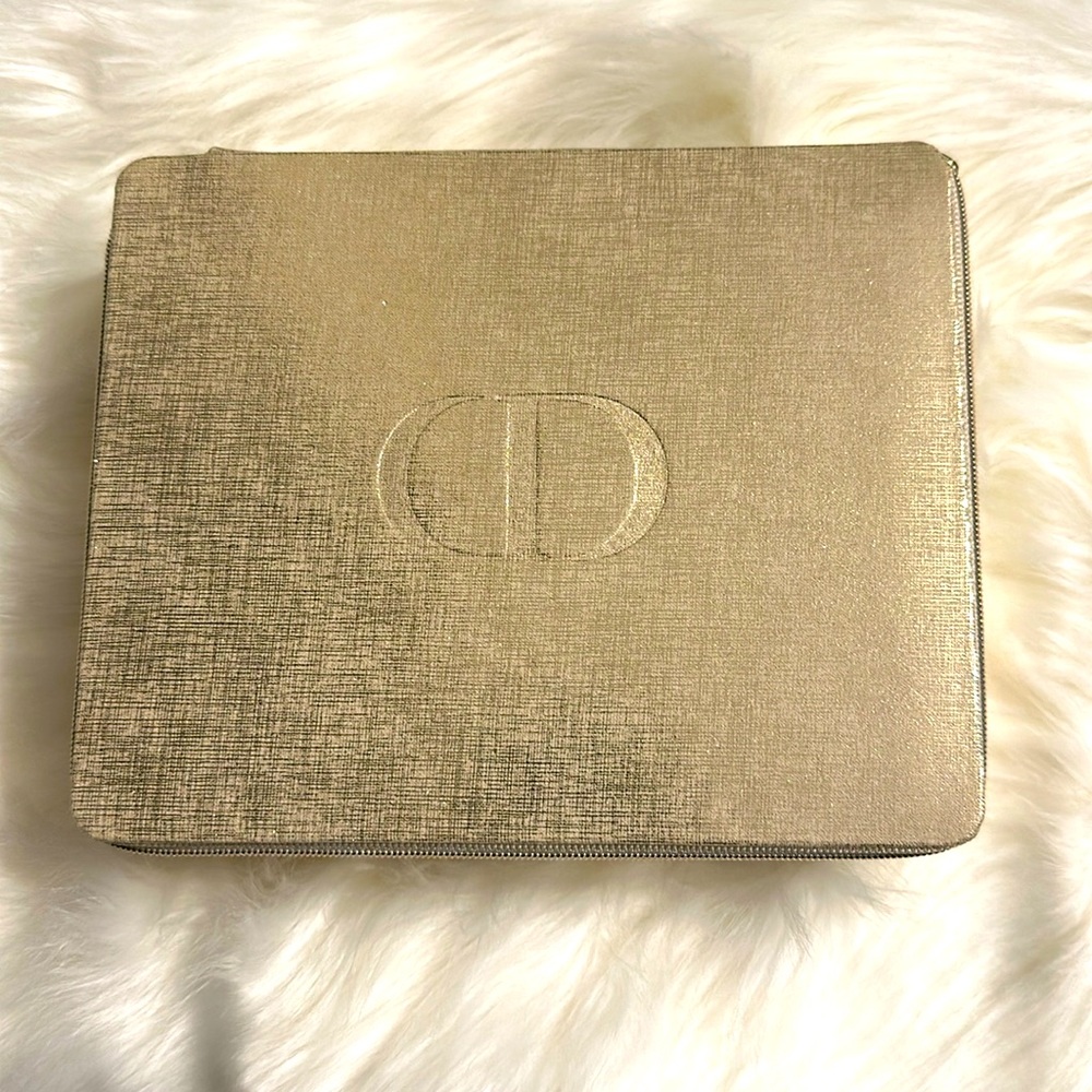 Dior travel case in light gold color